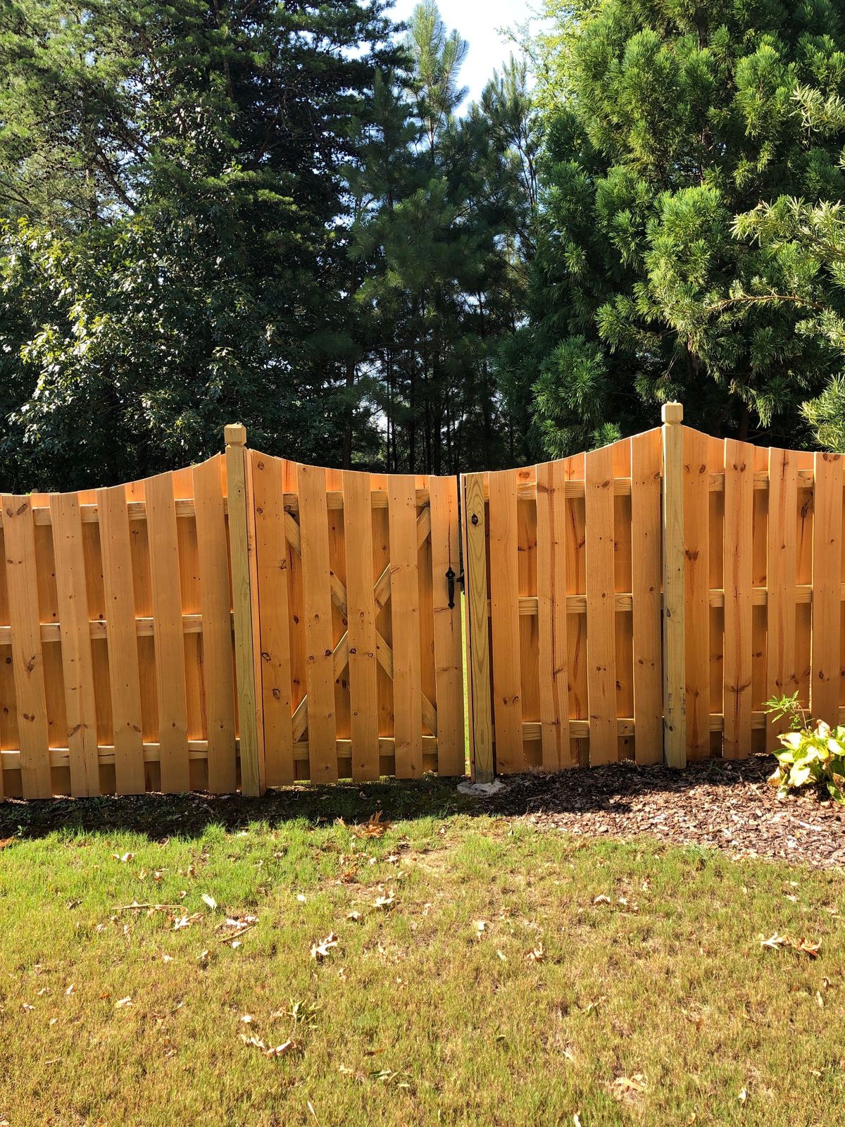 Shadowbox Scalloped Double Gate fence installed by Shelby Fence Company in Alabaster, AL