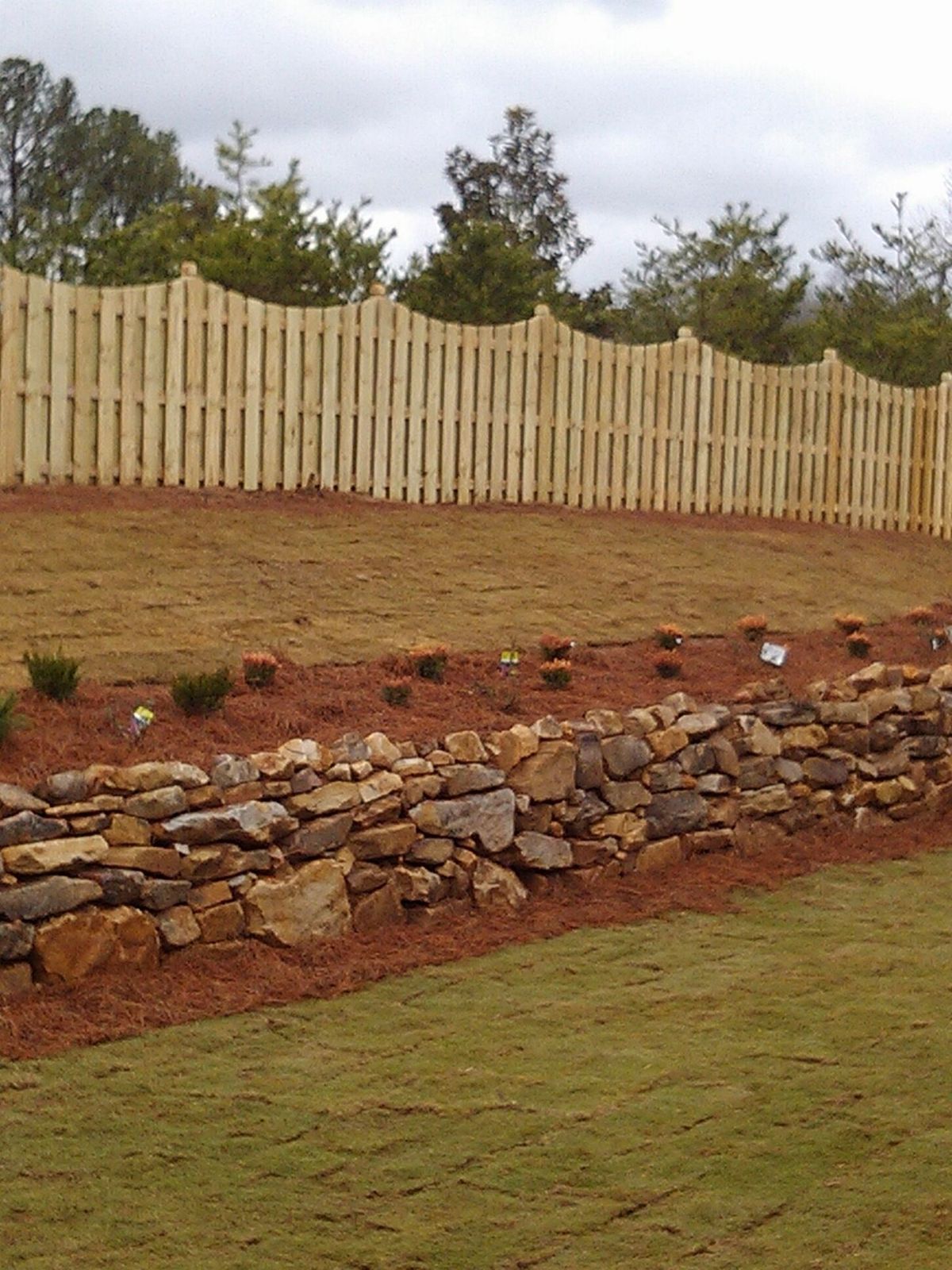 Shadowbox Scalloped fence installed by Shelby Fence Company in Alabaster, AL