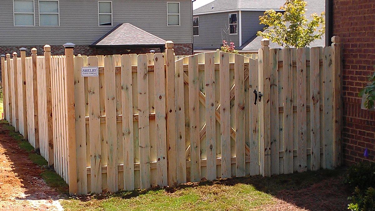 Shadowbox Straight Arched Gate fence installed by Shelby Fence Company in Alabaster, AL